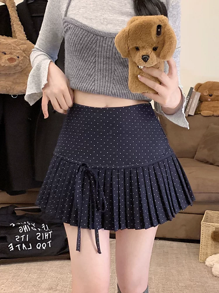 Váy xếp ly chấm bi màu đỏ thắt nơ cho nữ mùa thu đông, váy ngắn lưng cao chống lộ, váy chữ A nhỏ nhắn gợi cảm