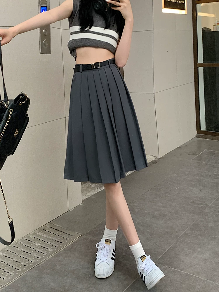 Váy xếp ly màu xám cỡ lớn, thiết kế lưng cao mùa hè dài đến giữa đùi, váy ngắn chữ A phong cách đại học độc đáo.