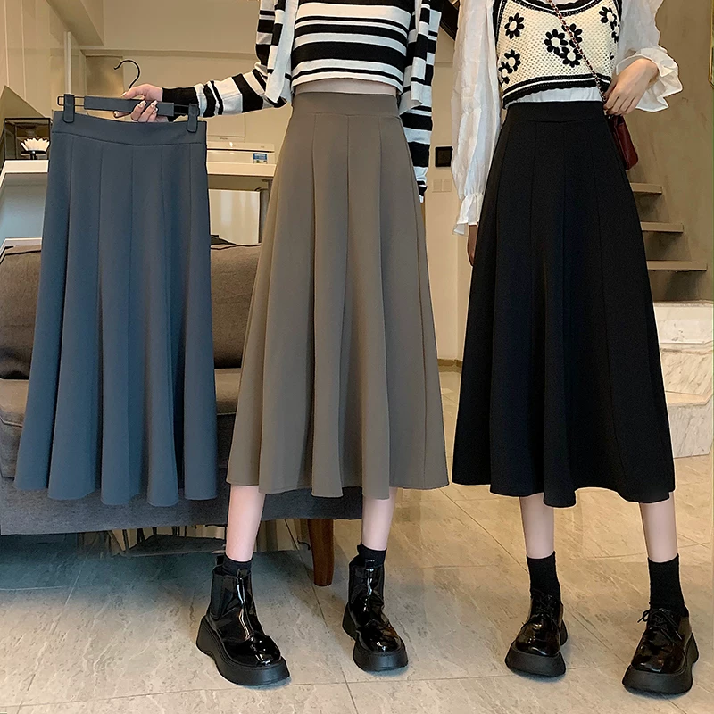 Váy dài vừa che hông cỡ lớn dành cho nữ, váy dù lưng cao thu đông 2023, váy nửa thân, váy chữ A siêu thịnh hành, váy xòe thon gọn.