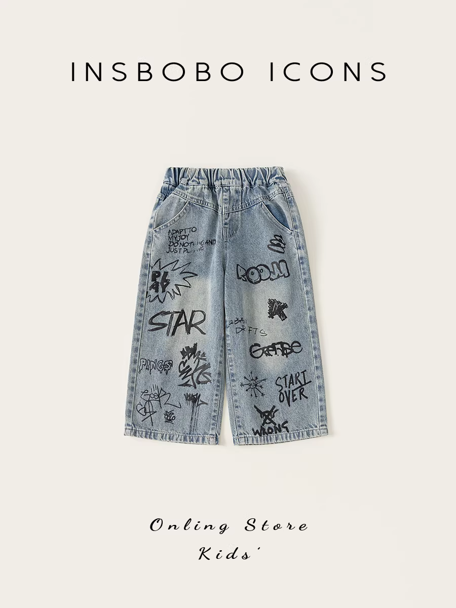 Quần áo thu đông bé gái 2025 quần trẻ em mới quần bò bé gái xuân thu quần dài bé trai họa tiết graffiti quần thẳng quần áo trẻ em