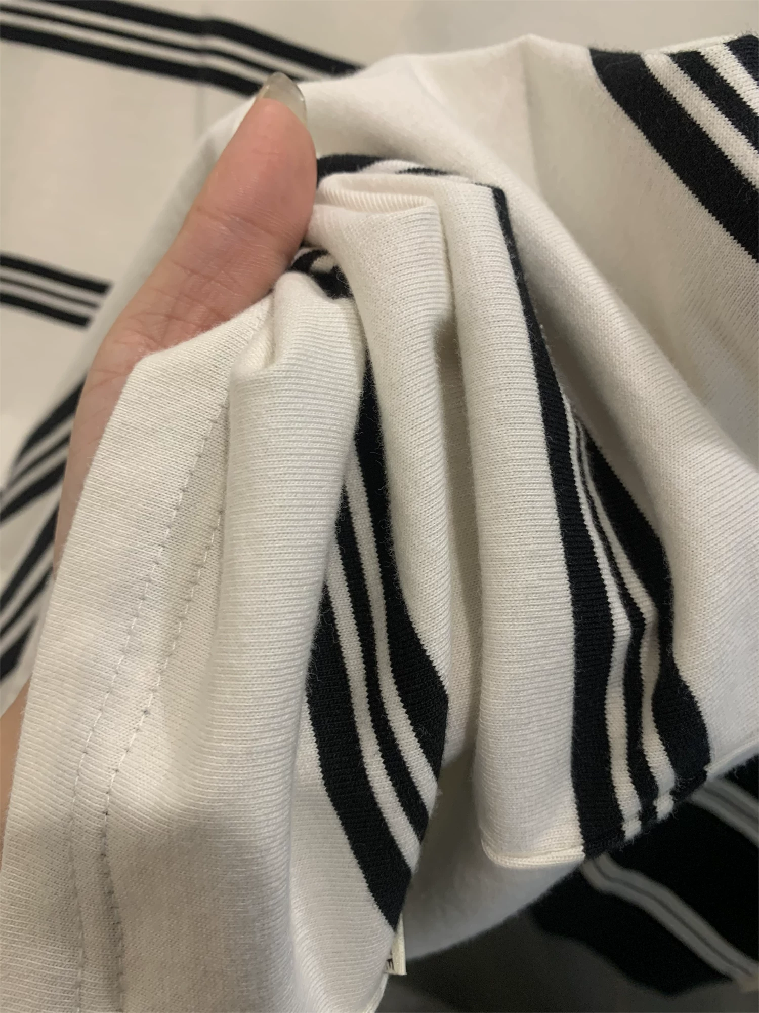 Don Quixote Xinjiang cotton dài sợi! Áo thun ngắn tay sọc cổ điển phong cách cặp đôi mùa hè hợp thời trang