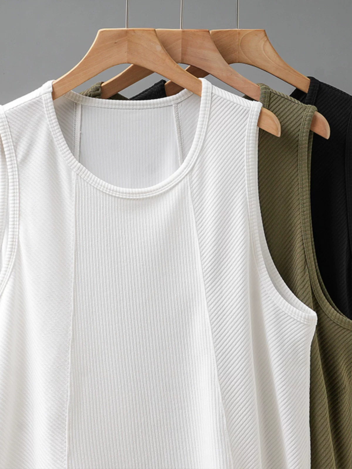 Áo ba lỗ sọc dọc kiểu Mỹ OMZM dành cho nam, áo thun thể thao không tay mới mùa hè 2025, áo lót rộng rãi.