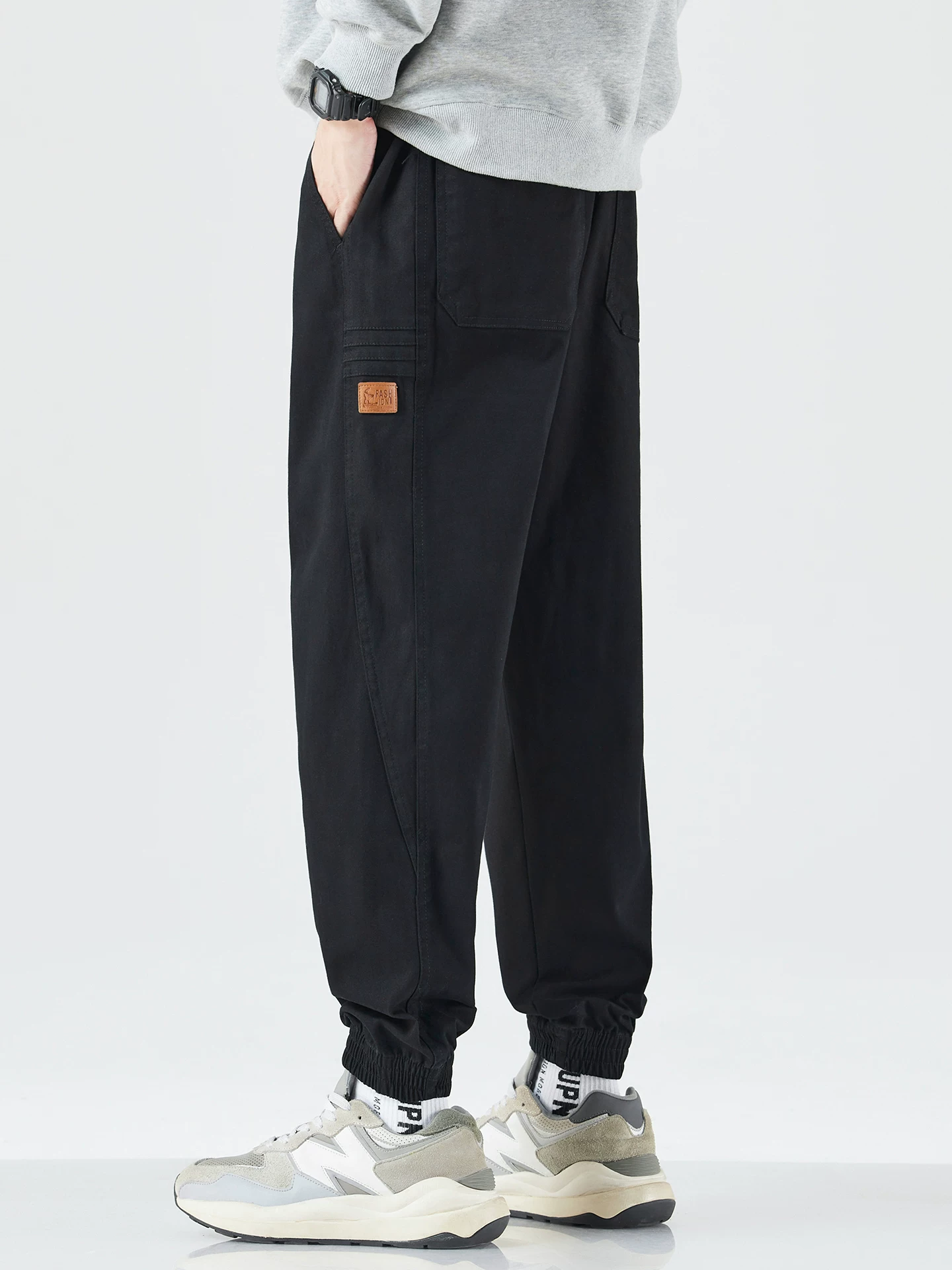 Quần cargo hạng nặng OMZM dành cho nam, quần ống côn dáng rộng mùa thu mang lại cảm giác cao cấp, quần thể thao kiểu harem phong cách Mỹ mát mẻ và sành điệu.