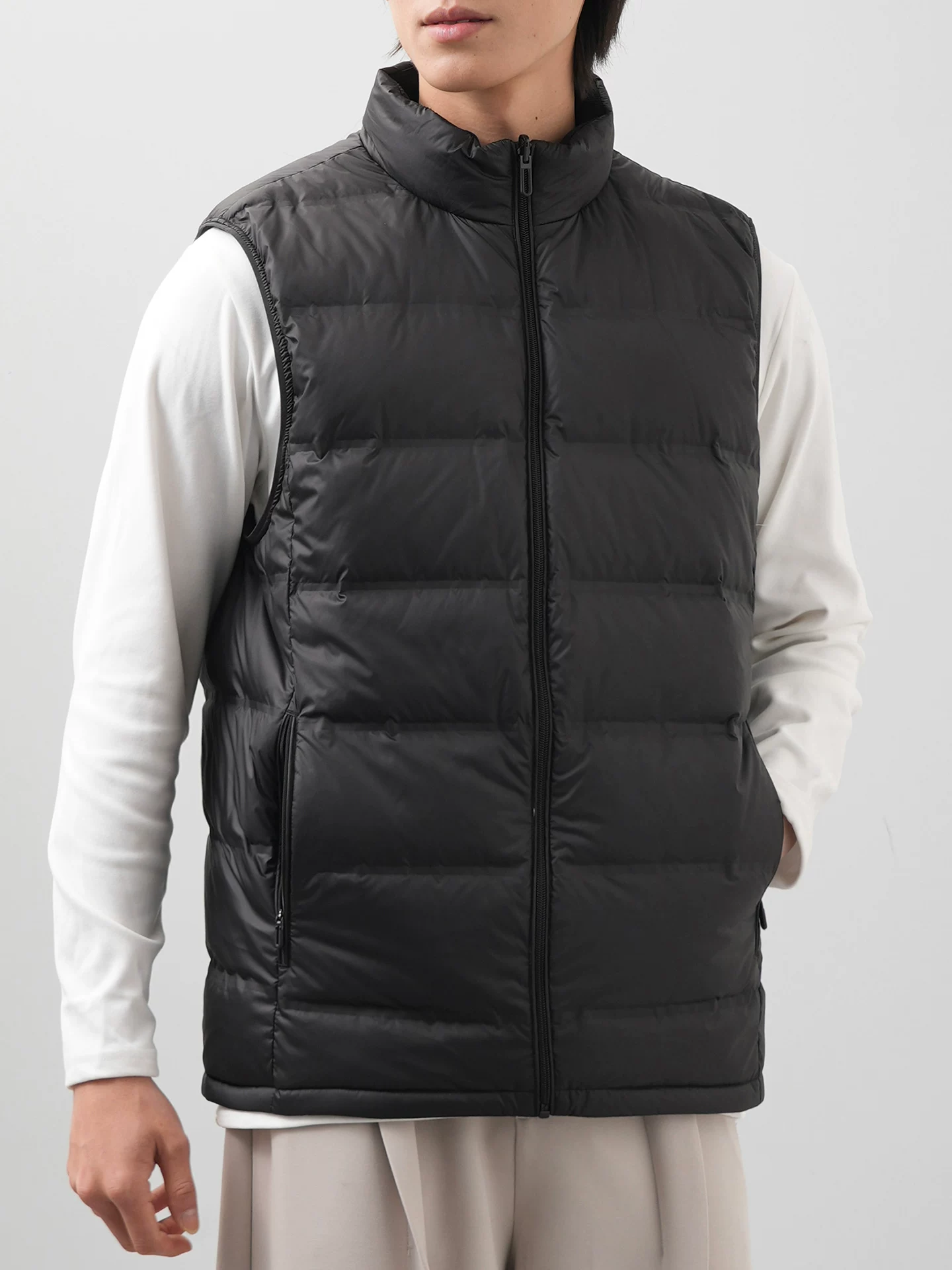 Áo vest nam OMZM có thể đảo ngược 90% lông vịt, áo khoác không tay có gân ấm áp phong cách Mỹ mùa đông có cổ đứng.