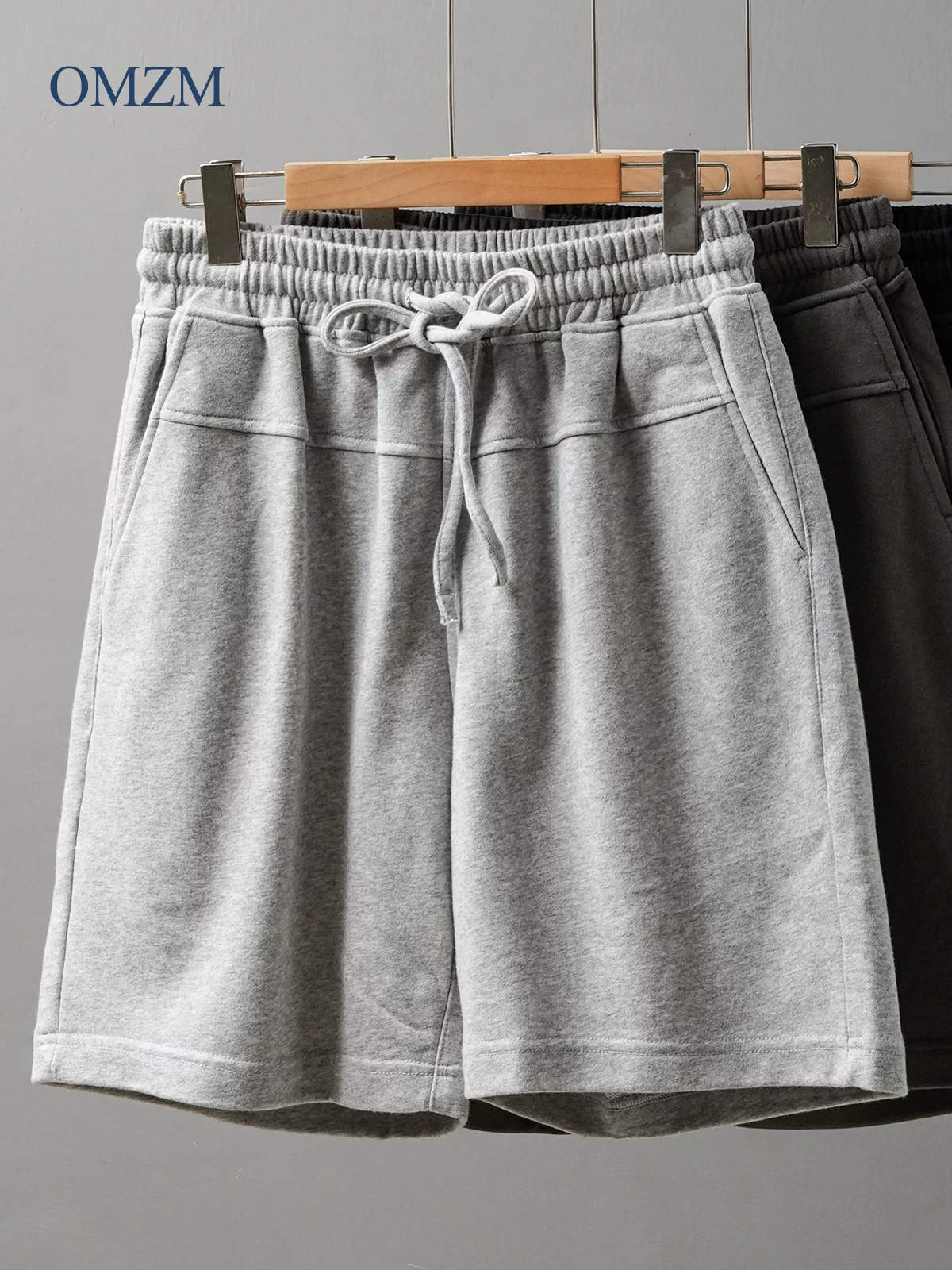 Quần short terry hạng nặng kiểu Mỹ của OMZM dành cho nam, quần thể thao mỏng thoáng khí mùa hè, quần short dài đến đầu gối màu trơn rộng rãi