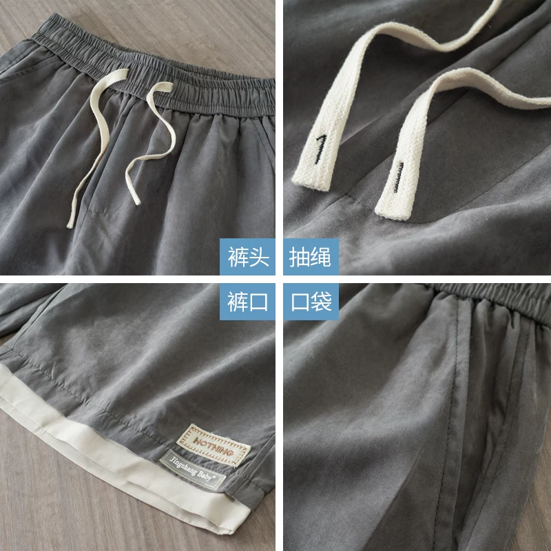 Quần short khô nhanh bằng vải lụa băng OMZM dành cho nam, quần short dài vừa phải thoáng khí mùa hè, quần short thể thao giả hai mảnh phong cách Mỹ dành cho thanh thiếu niên.
