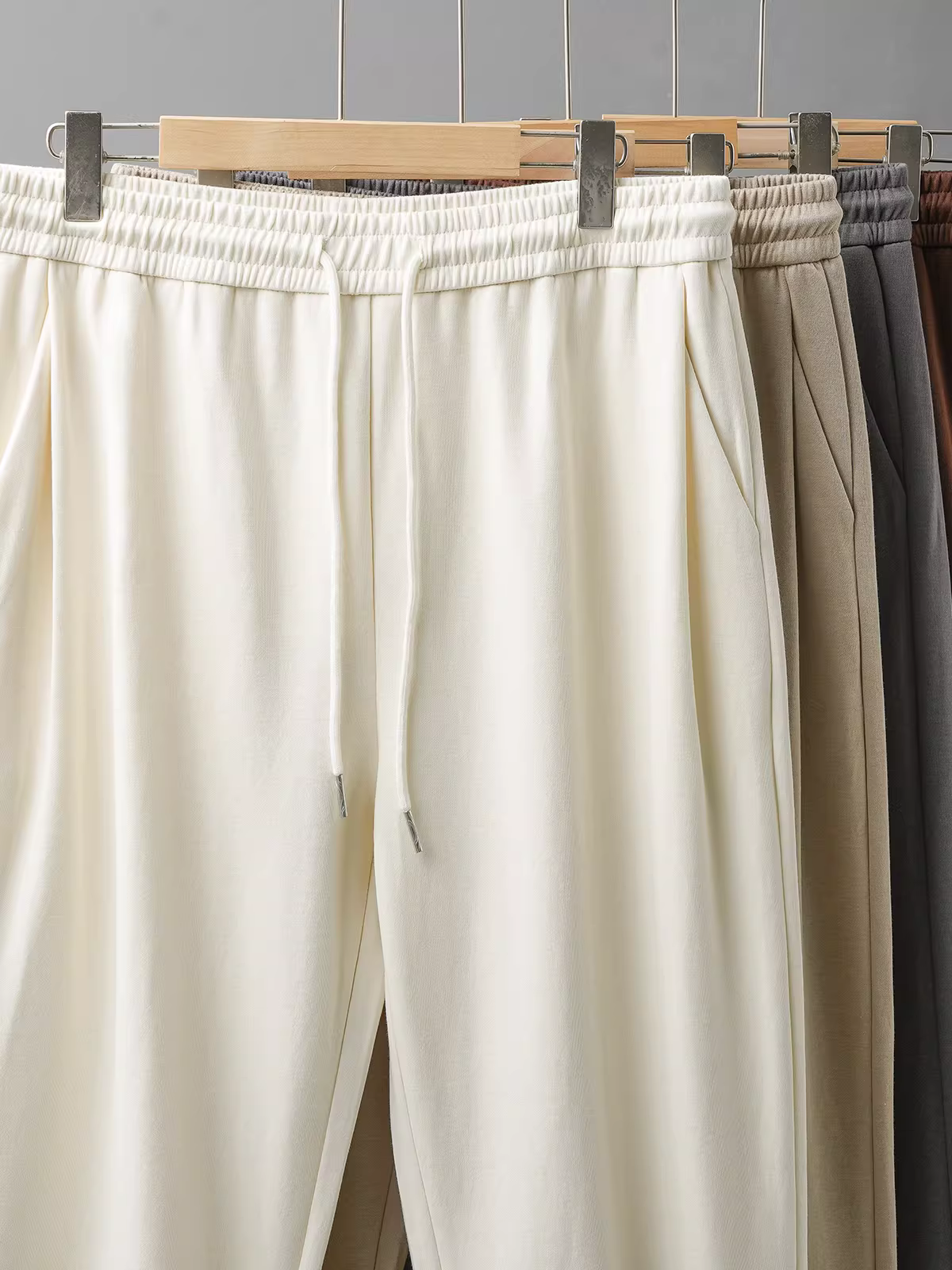 Quần jogger nam kiểu Mỹ, quần harem ống rộng cạp chun mùa hè mới 2025, quần thể thao năng động ống lửng.