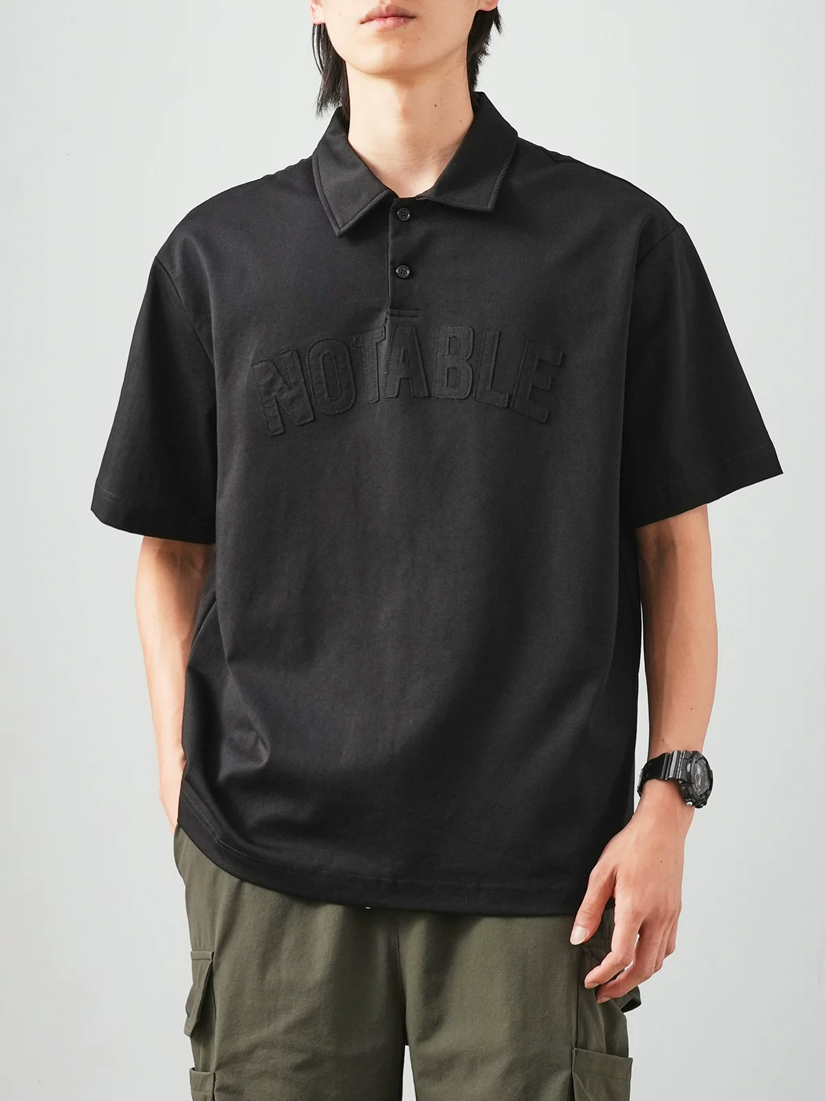 Áo polo nam OMZM chất liệu cotton lụa mát lạnh tay ngắn mùa hè, áo thun in chữ phong cách đường phố, dáng rộng, cổ trụ, tay lửng.