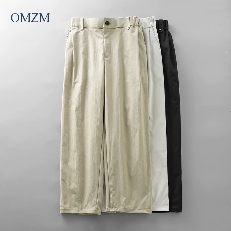 Quần âu nam dáng thẳng phong cách Mỹ OMZM, mẫu mới xuân 2025, quần ống đứng rộng, dáng suông, màu kaki, kiểu retro, quần dài