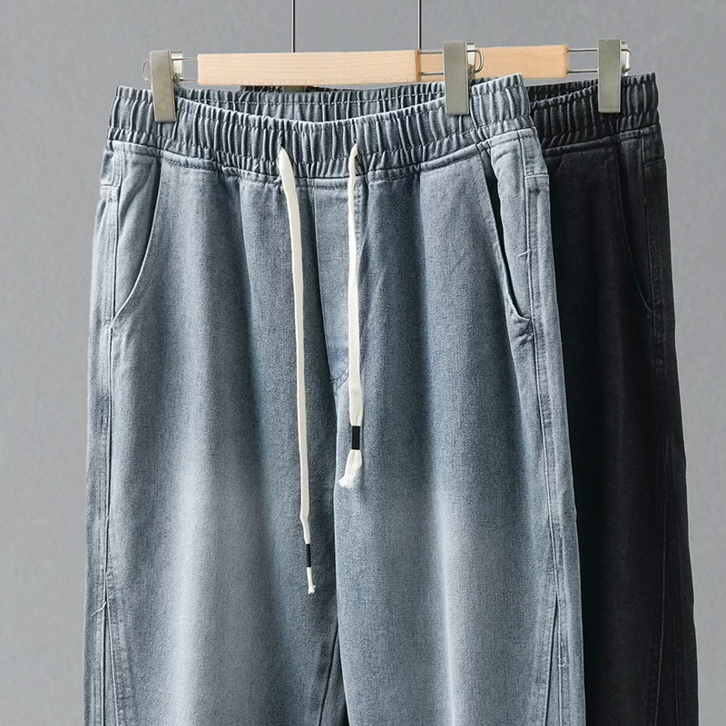 Quần jeans thẳng dáng rộng phong cách Mỹ OMZM dành cho nam, mẫu mới xuân 2025, kiểu vintage, cạp cao, dáng rộng, chất liệu mềm mại, phong cách thường ngày