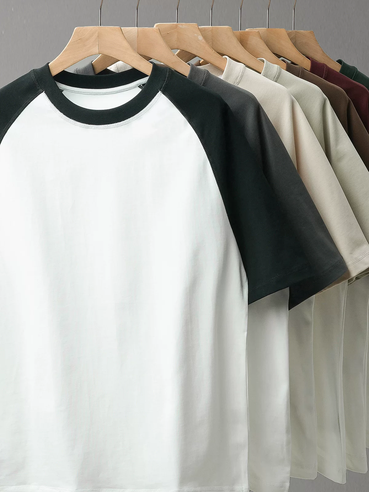 Áo thun nam 300G chất liệu dày dặn, tay ngắn, kiểu mới hè 2025, tay raglan phối màu, dáng rộng, chất liệu cotton nguyên chất.