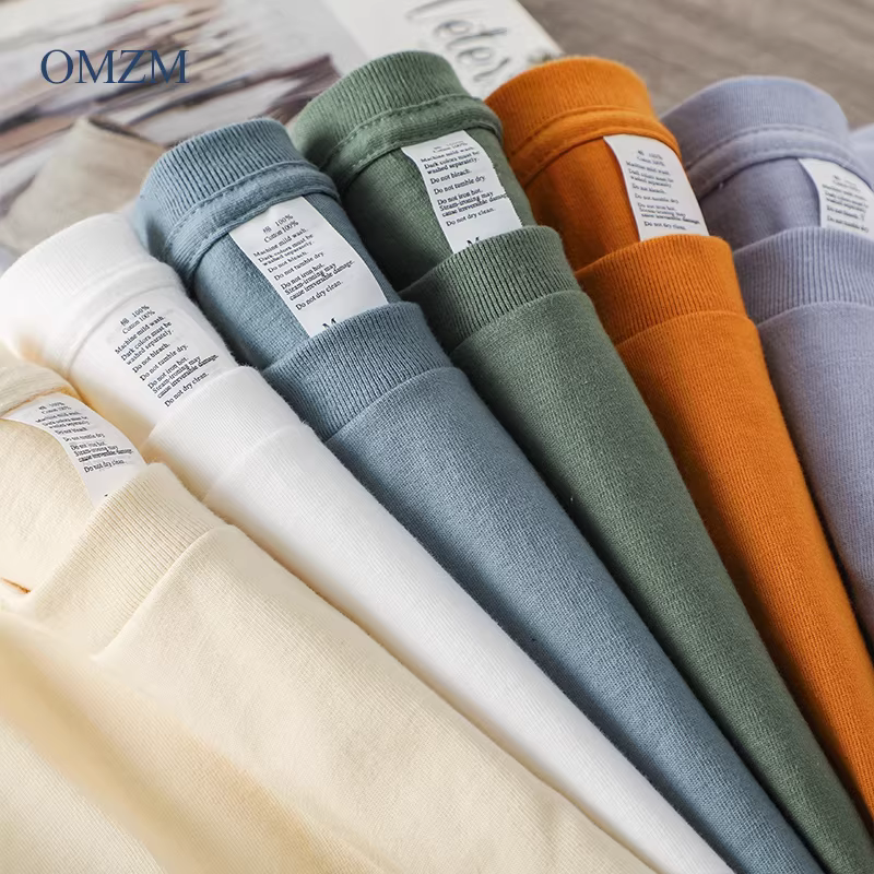 OMZM Áo thun dài tay bằng cotton nguyên chất hạng nặng 300G kiểu Mỹ dành cho nam, phong cách tối giản, áo sơ mi màu xuân thu, áo len cổ tròn nguyên chất.