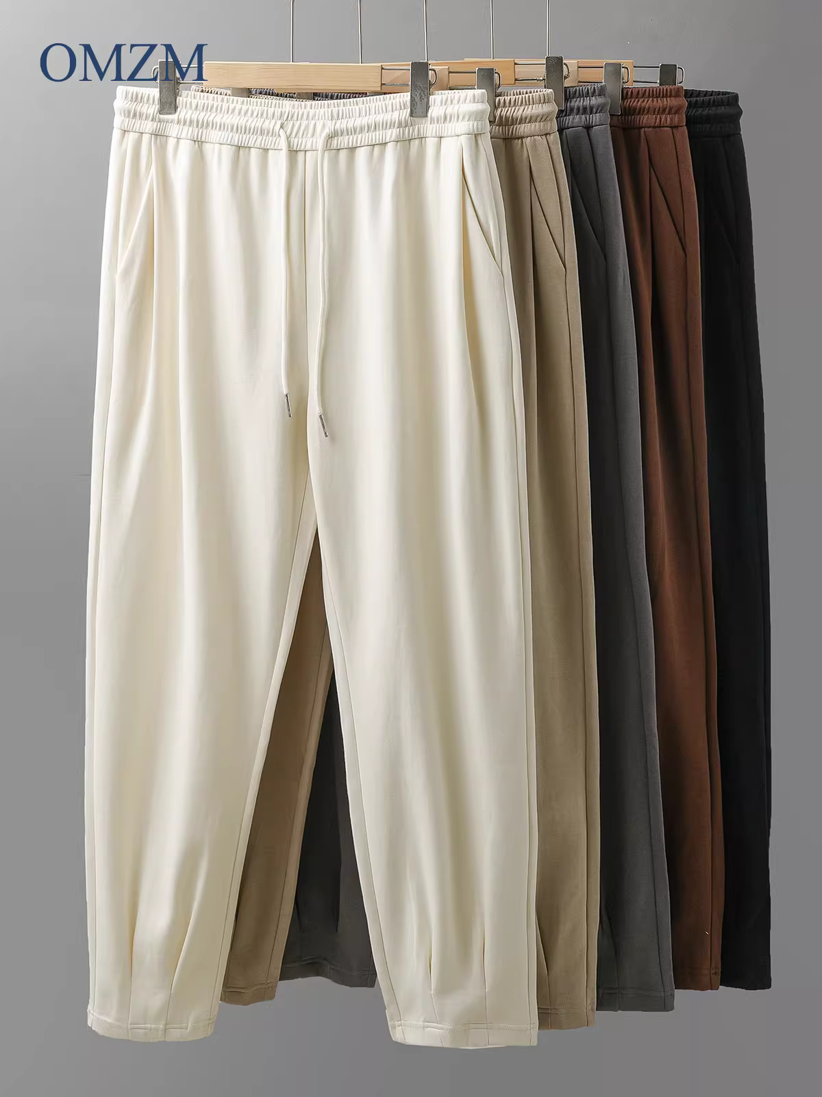 Quần jogger nam kiểu Mỹ, quần harem ống rộng cạp chun mùa hè mới 2025, quần thể thao năng động ống lửng.