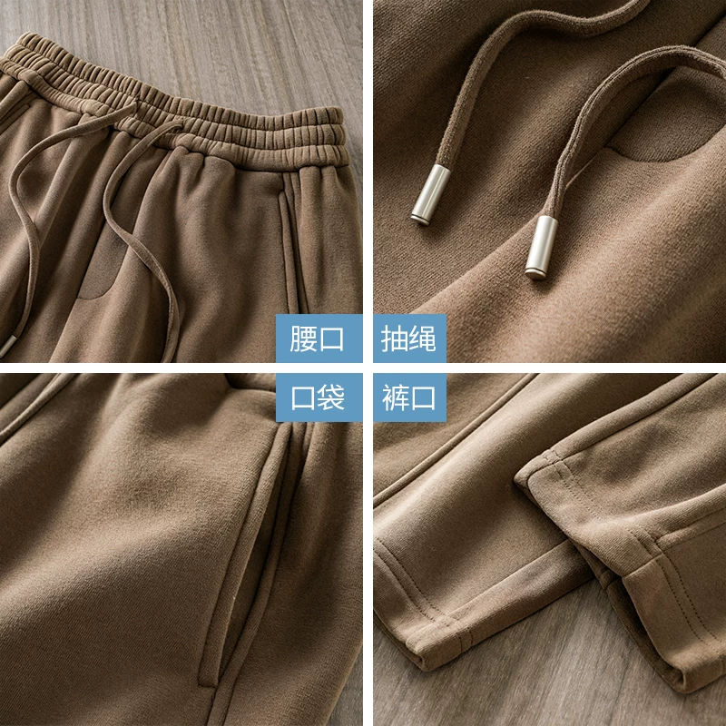 Quần thể thao nam OMZM460G lót lông cừu dày dặn, giữ ấm mùa đông, kiểu dáng thể thao, quần ống rộng, dáng suông.