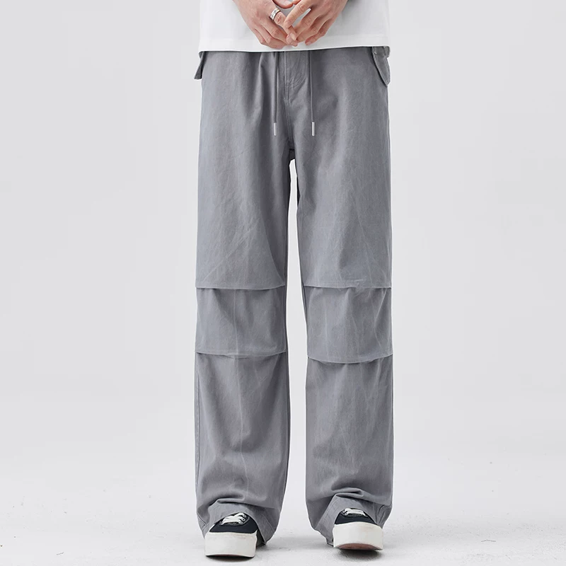 Quần dù rộng ống chất liệu cotton nguyên chất hạng nặng OMZM dành cho nam, mẫu mới hè 2025, quần dài rộng rãi, kiểu dáng gọn gàng, quần thường ngày thời trang