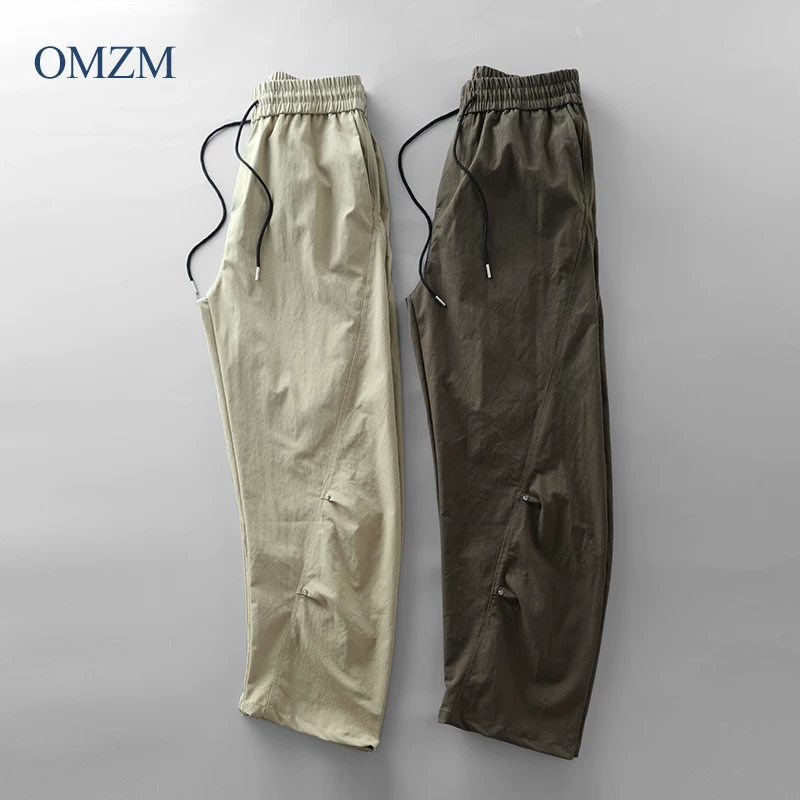 Quần lính dù kiểu Mỹ OMZM dành cho nam 2025, mẫu mới xuân thu, phong cách đường phố, dáng rộng, xếp ly, quần cargo ống thẳng, quần thể thao