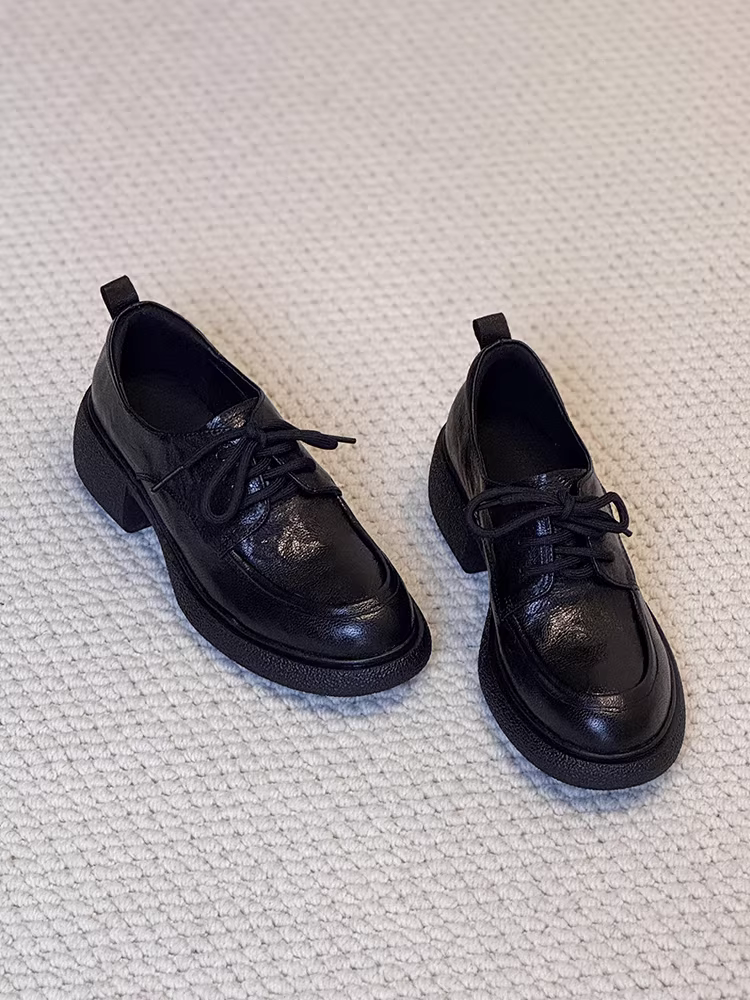 Phiên bản da cừu ~ Giày lười đi làm đế bằng da thật màu đen dành cho nữ, giày lười kiểu cổ điển buộc dây kiểu đại học cắt sâu.