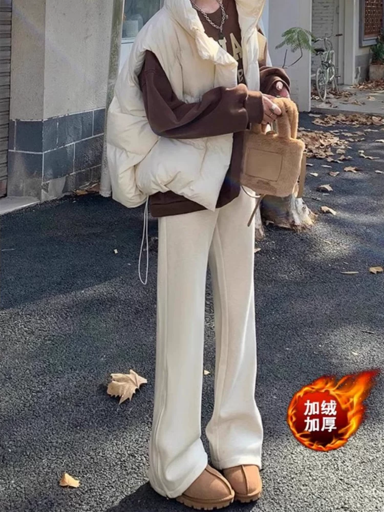 Quần ống loe dày lót lông cừu màu trắng nhạt dành cho nữ, mùa thu đông, cỡ lớn, lưng cao, dáng suôn, che hông, quần ống chuông giúp thon gọn.