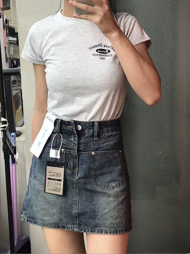 Váy ngắn denim màu xanh cổ điển hình quả lê dành cho nữ, kiểu dáng mỏng mùa hè, cỡ lớn, eo cao, che hông, váy chữ A thon gọn.