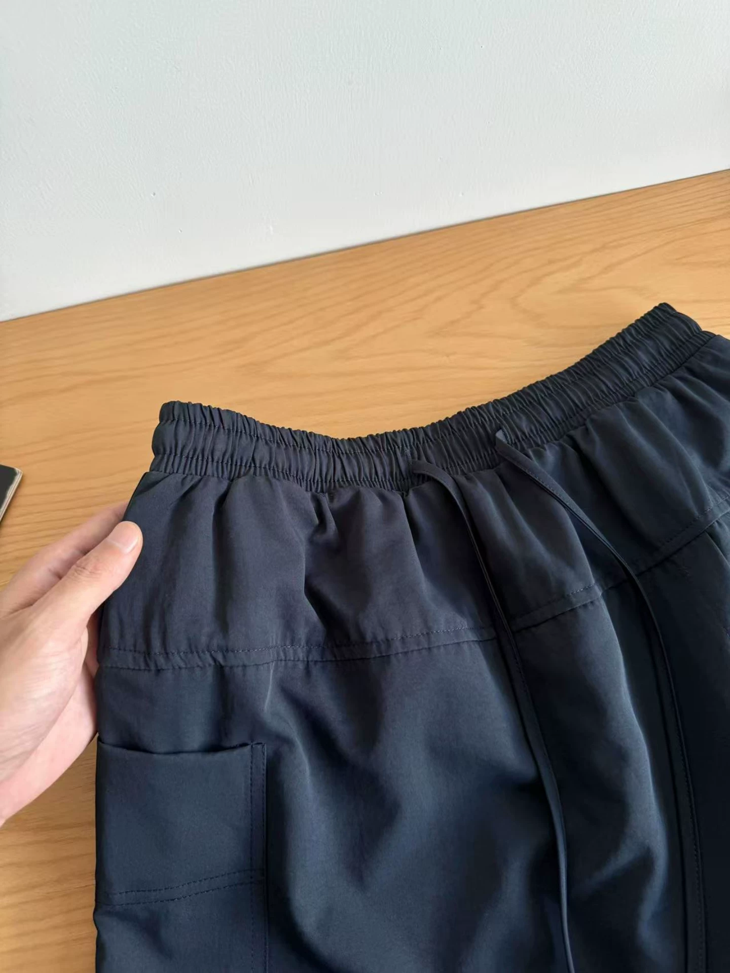 Váy quần công sở màu xanh hải quân dành cho nữ, kiểu dáng mỏng mùa hè 2025, size lớn, cạp cao, che hông, dáng chữ A, ngắn năm phần, tôn dáng.