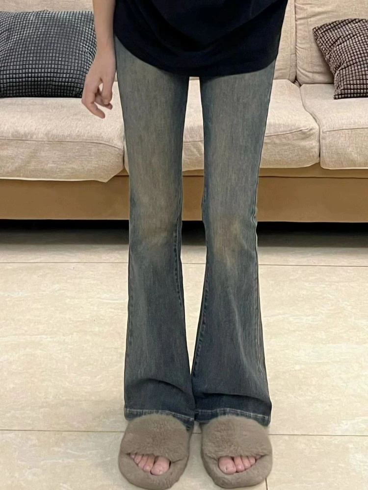 Quần jean ống loe màu xanh cổ điển dành cho nữ, kiểu dáng mới đầu xuân, cỡ lớn, lưng cao, co giãn, che hông, quần ống loe tôn dáng.