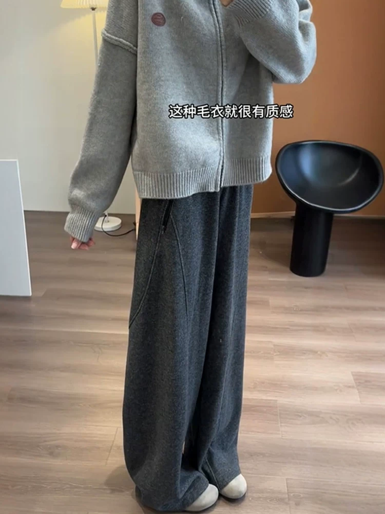 Quần âu nữ ống rộng màu xám, dáng suông, chất liệu len, lót lông cừu, dày dặn, cạp cao, mềm mại, phù hợp với dáng người quả lê, size lớn, mùa đông.