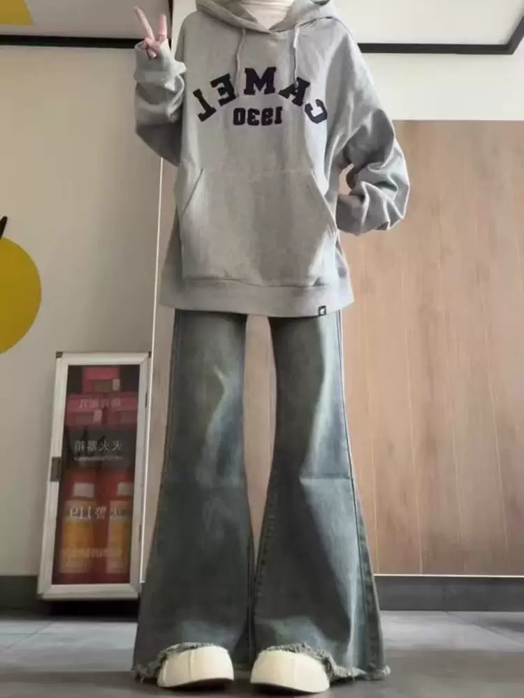 Quần jeans loe nữ, xuân 2025, size lớn, cạp cao, dáng rộng, che hông, tôn dáng, ống chuông, dài chạm sàn