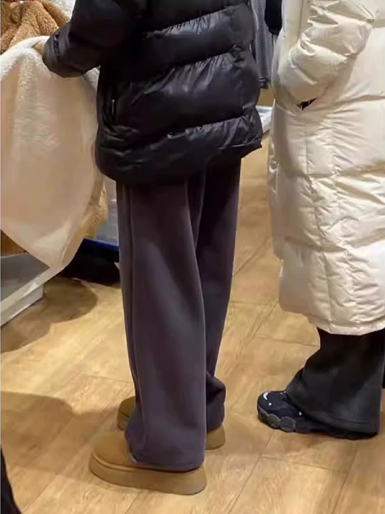 Quần thể thao dày dặn lót lông cừu dành cho nữ, kiểu dáng thu đông mới, cỡ lớn, cạp cao, che hông, dáng suôn, tôn dáng, quần ống rộng thể thao.