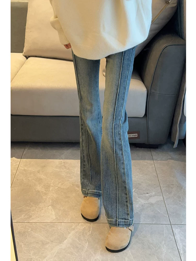 Quần jean micro-flared màu xanh cổ điển dành cho nữ, phong cách đầu xuân, cỡ lớn, lưng cao, co giãn, che hông, quần jean kiểu móng ngựa giúp thon gọn