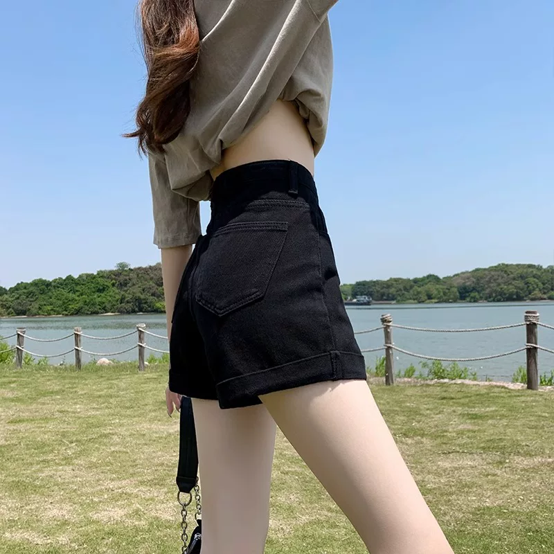 Quần short denim đen dành cho nữ, cỡ lớn mùa hè, cạp cao, quần short chữ A co giãn, che hông, giảm béo, viền quần cuộn, quần ống rộng.