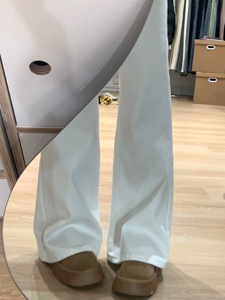 Quần jean loe nữ không bó sát chân, kiểu mới thu đông 2025, size lớn, cạp cao, co giãn, tôn dáng, quần ống chuông màu trắng