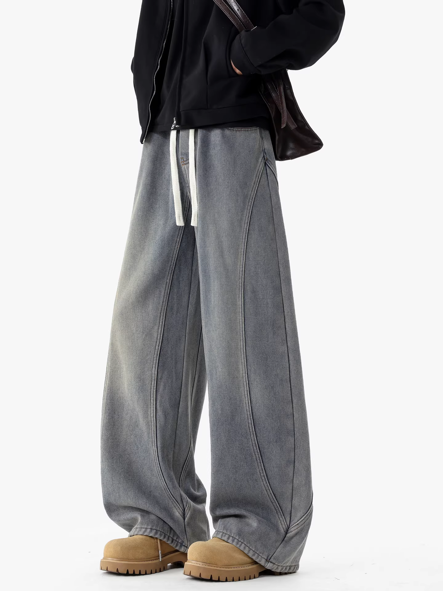 Wukong có sẵn quần jean nam kiểu Mỹ, thiết kế phá cách, phối vải, lót lông cừu, giặt mềm, dáng rộng, ấm áp, dài.