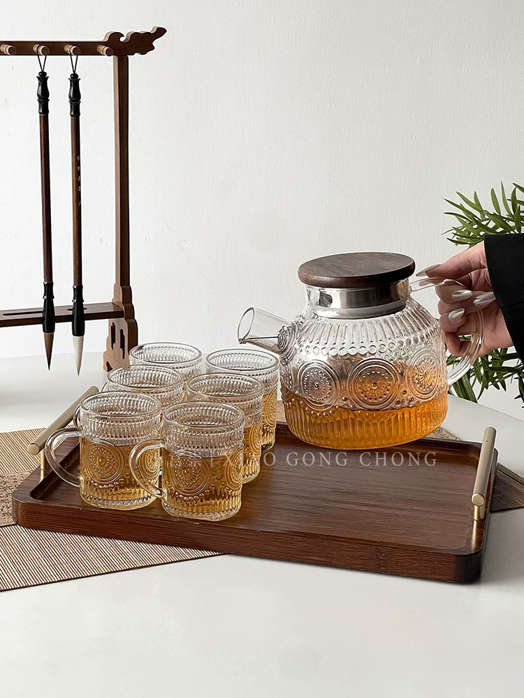 Bộ ấm trà và bộ trà Trung Quốc có vẻ ngoài thẩm mỹ cao, cốc nước thủy tinh hình hoa hướng dương, bình nước lạnh chịu nhiệt cao gia dụng, bình giữ nhiệt.