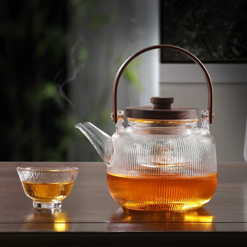 Ấm trà thủy tinh borosilicate cao cấp, chịu nhiệt cao, dung tích lớn 1L, tích hợp chức năng hấp và đun sôi, tách trà nước.