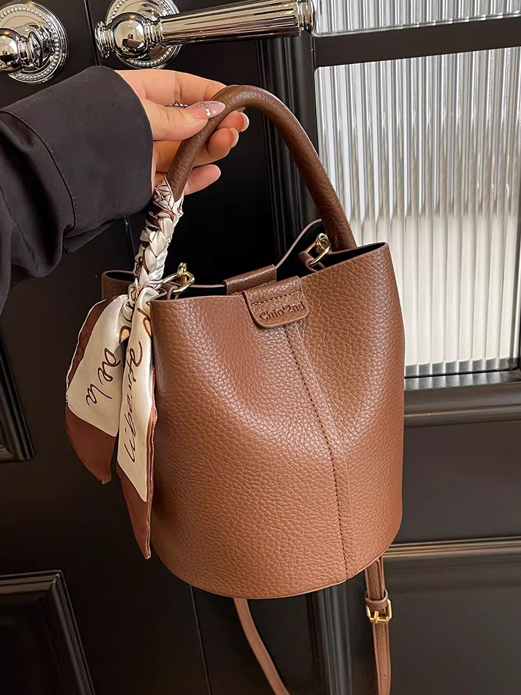 Túi xách retro nữ 2025 mới thu đông cao cấp, cầm tay, đeo vai, thời trang đa năng, chất liệu có vân, đeo chéo