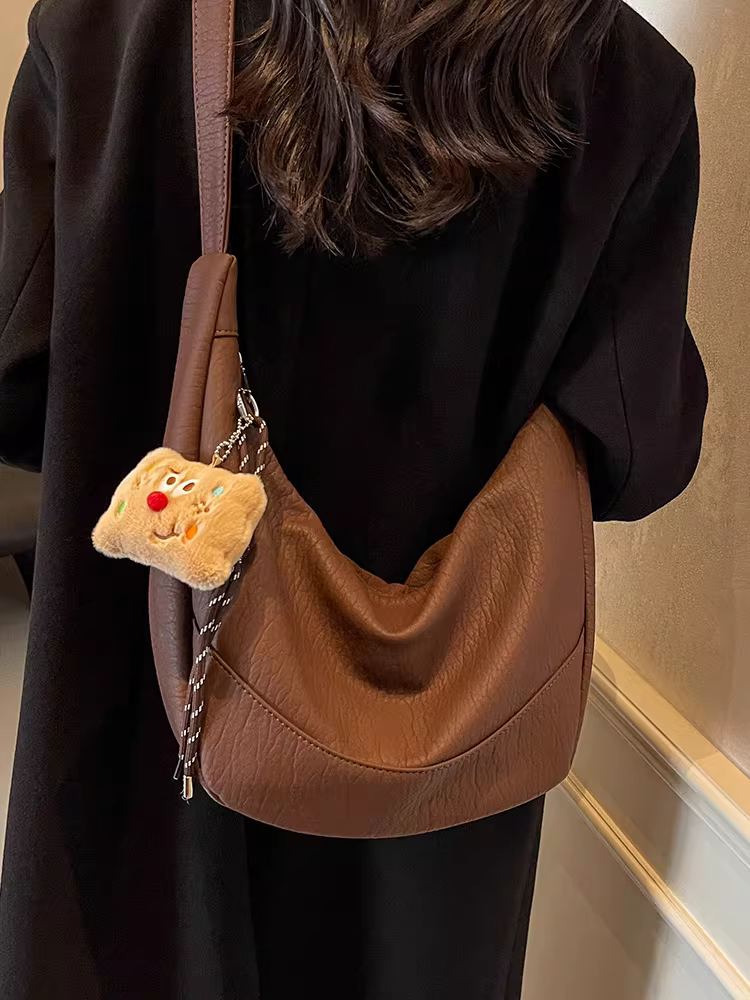 Túi xách nữ cao cấp, chất liệu có vân, dung tích lớn, mẫu thiết kế độc đáo mùa thu đông 2025, túi đeo chéo phong cách cổ điển, túi bánh bao đi làm.