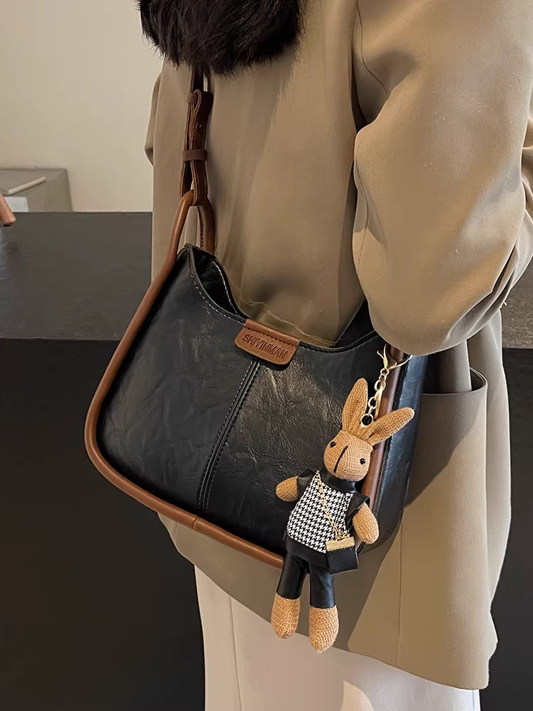 Túi xách cao cấp dành cho nữ, mẫu mới thu đông 2025, kiểu vintage đa năng, đeo vai/chéo, túi bucket thời trang phổ biến