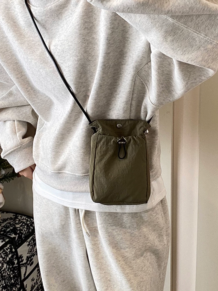 Túi điện thoại vải canvas nữ, đeo chéo, kiểu mới 2025, đa năng, thiết kế độc đáo, ví đựng tiền xu đeo vai đơn, túi nhỏ cao cấp.