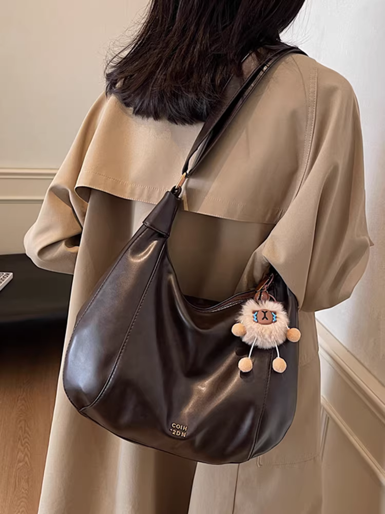 Túi xách cổ điển dành cho nữ, dung tích lớn, thiết kế độc đáo mùa thu đông 2025, túi đeo chéo một bên vai, túi đi làm kiểu bánh bao.