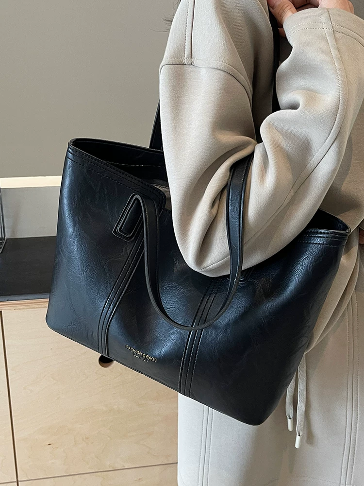 Túi đi làm hàng ngày dành cho nữ, dung tích lớn, kiểu dáng thu đông 2025 mới, đơn giản và đa năng, đeo vai, túi tote cao cấp
