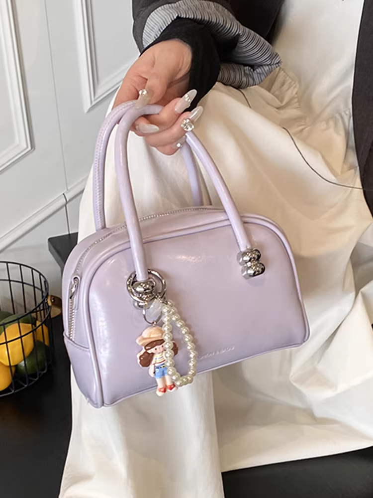 Túi Boston nữ thời thượng năm nay, mẫu túi đeo chéo/vách vai mới mùa hè 2025, phong cách Hàn Quốc, kiểu túi gối.