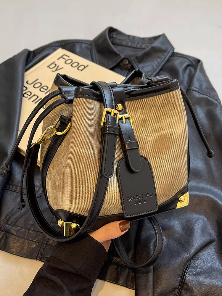 Túi xách nữ 2025 túi đeo chéo mới mùa thu đông túi xô thiết kế độc đáo túi cao cấp đa năng túi đeo vai cổ điển