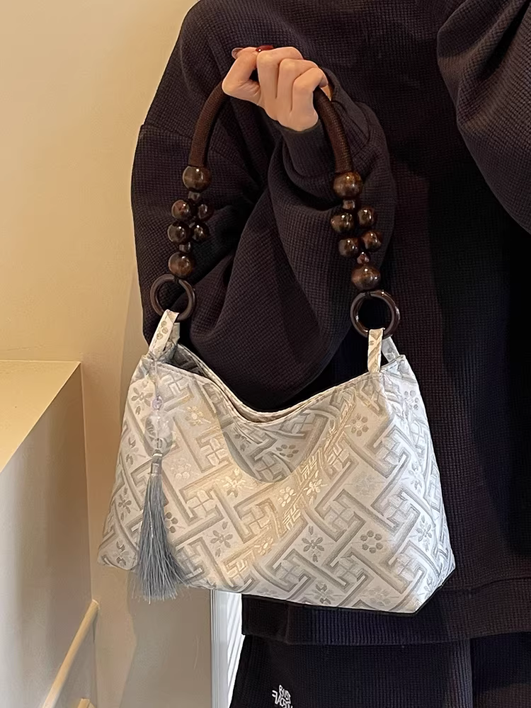 Túi xách nữ phong cách Trung Hoa mới Quảng Tây thổ cẩm 2025, kiểu tua rua, đa năng, đeo vai/nách, siêu hot