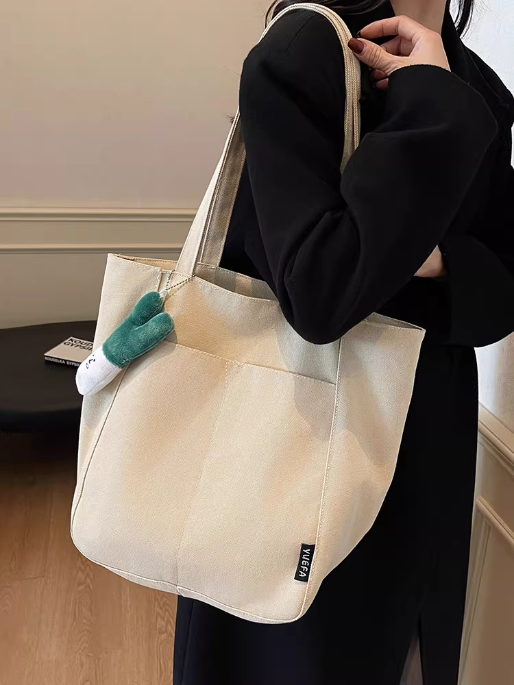 Túi vải canvas nữ, dung tích lớn, mẫu mới thu đông 2025, túi đeo vai đa năng, phong cách thường ngày, thích hợp đi học, đi làm