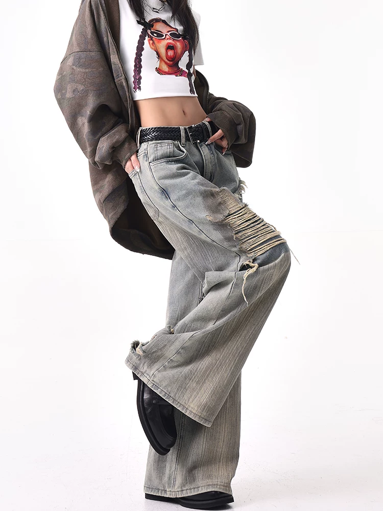 KEN STUDIO mùa thu đông phong cách mới màu xanh lam hai lớp rách giả hai mảnh quần jean nối liền quần ống rộng thẳng dành cho nữ