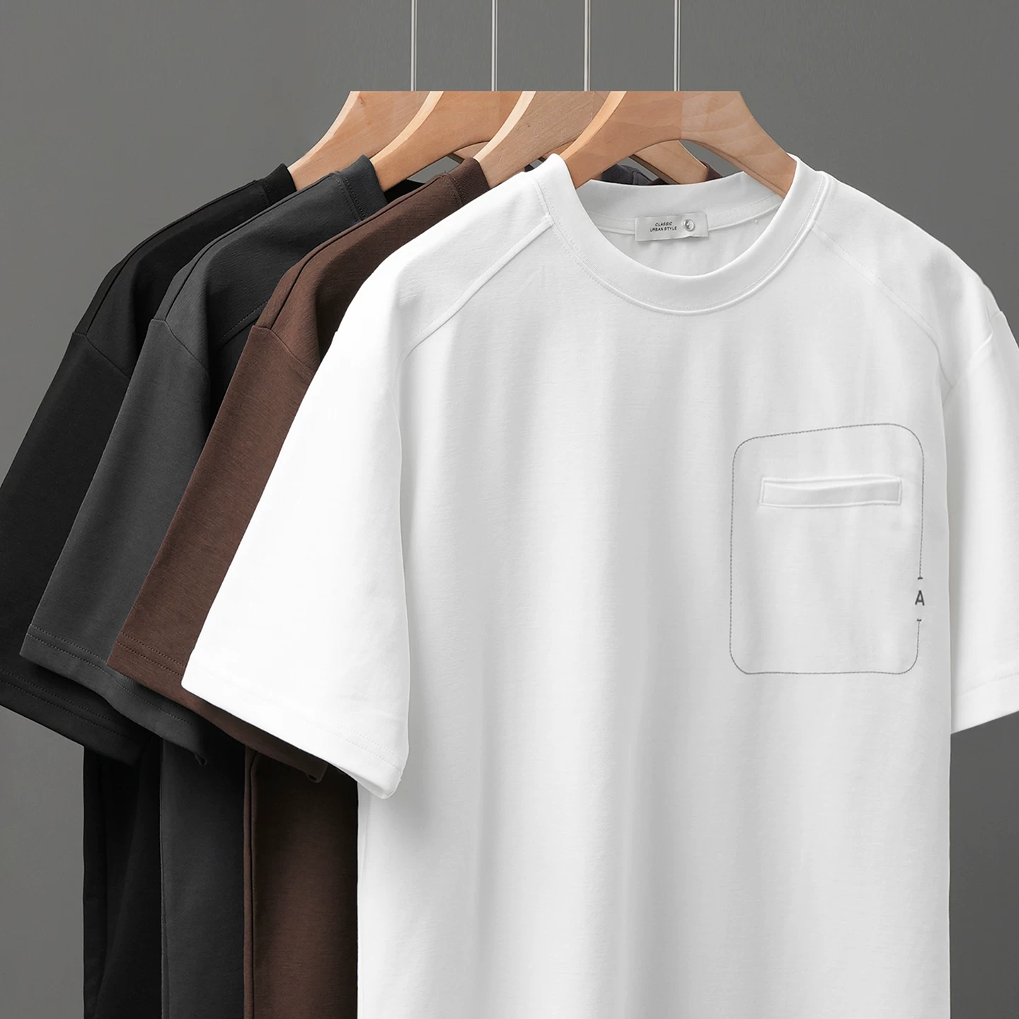 Áo thun cotton lụa mát mẻ tay ngắn nam mùa hè thiết kế theo phong cách Mỹ có túi cổ tròn trễ vai tay áo năm phần tư
