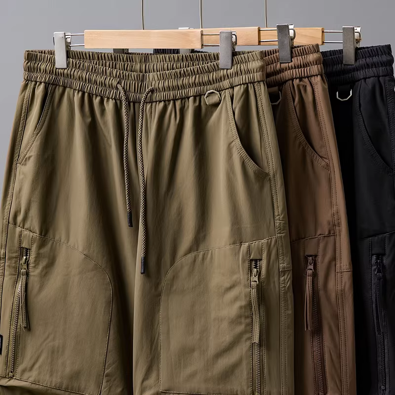 Quần công tác dày dặn dành cho nam, quần lính dù chức năng chống thấm nước mới mùa thu đông 2024, quần ống đứng dáng rộng hợp thời trang.