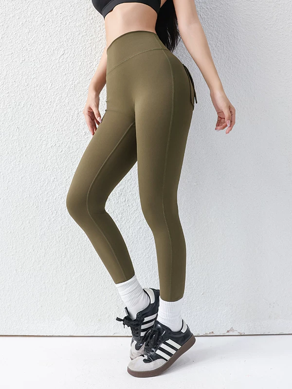 Quần yoga cạp cao dành cho nữ màu hạt dẻ, co giãn và ôm sát, thích hợp cho các môn thể thao ngoài trời, thoáng khí, giúp định hình bụng và nâng mông.