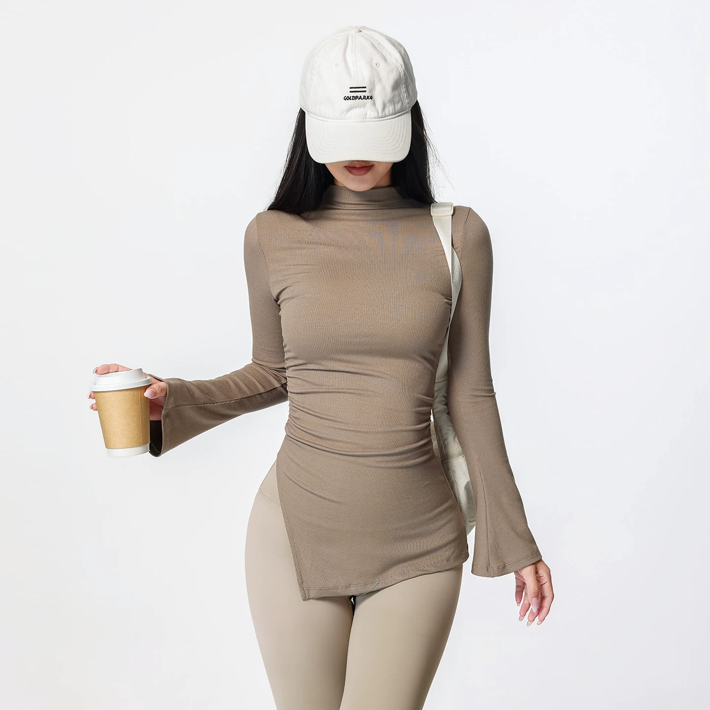 Jiumai Cao cấp Cổ cao nửa cổ che hông Quần áo tập yoga bó sát thể thao tay dài loe Áo tập Pilates Mới.