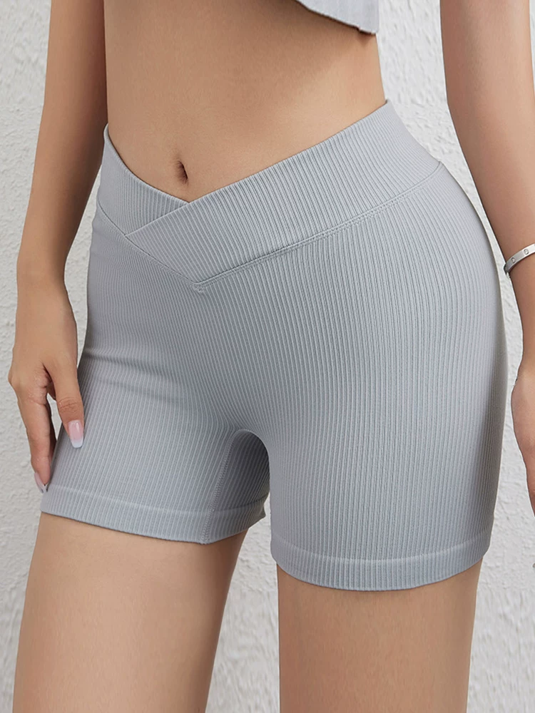 Quần short tập yoga phong cách Âu Mỹ dành cho nữ, eo chữ V, tôn dáng mông đào, cạp cao, chạy bộ, tập thể dục, ôm sát, co giãn, quần short thể thao liền mạch.